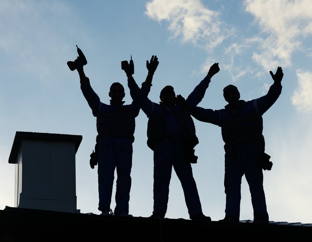 Building roof construction site teamwork silhouette Building roof construction site teamwork silhouette
