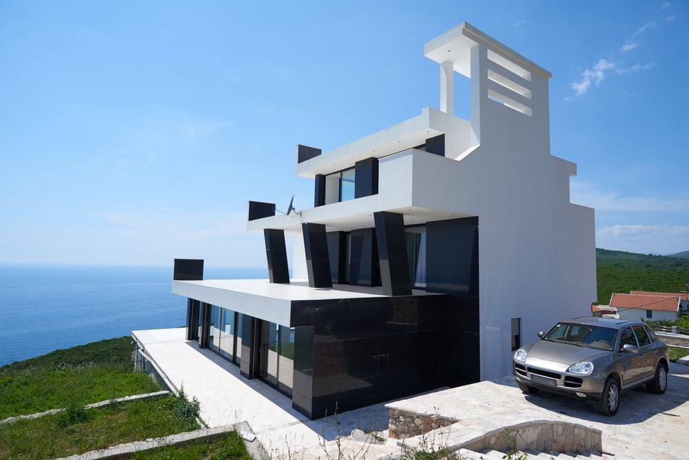 External view of a contemporary house modern villa at sunset External view of a contemporary house modern villa at sunset